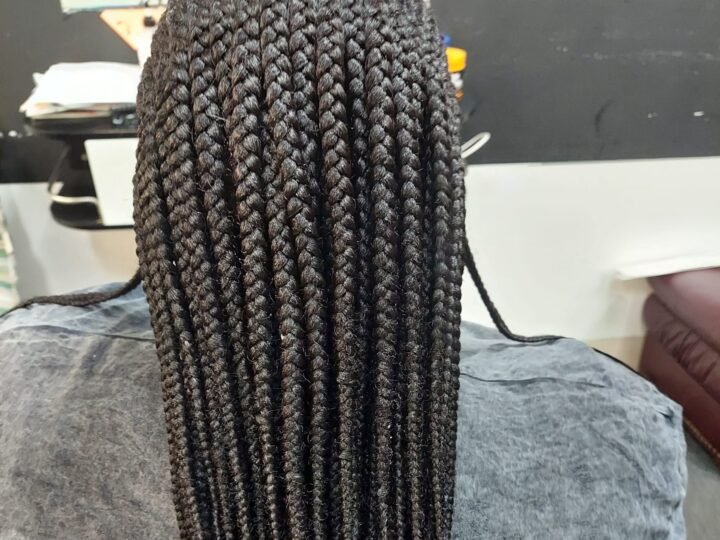 Cornrows in front boxbraid in back