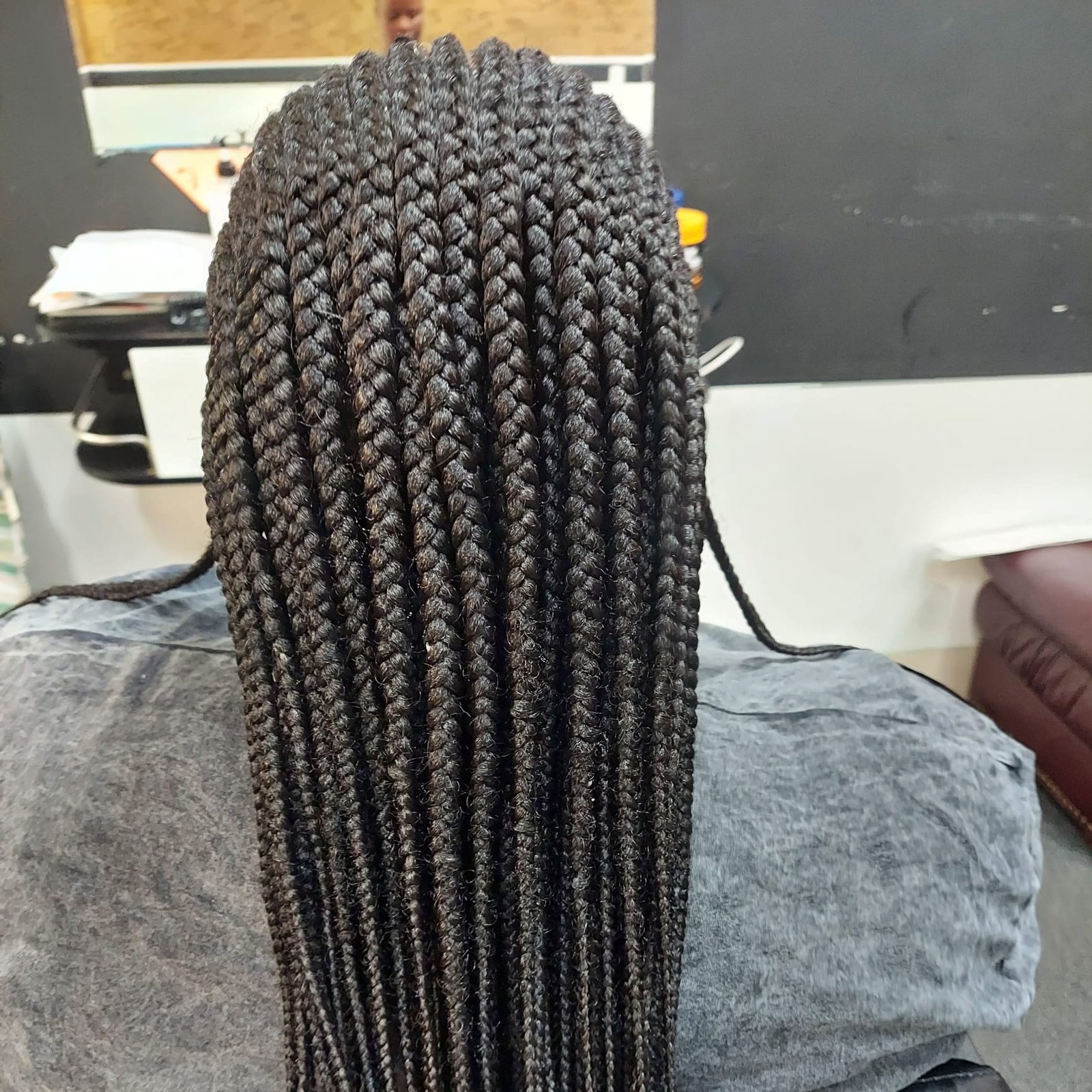 Cornrows in front boxbraid in back